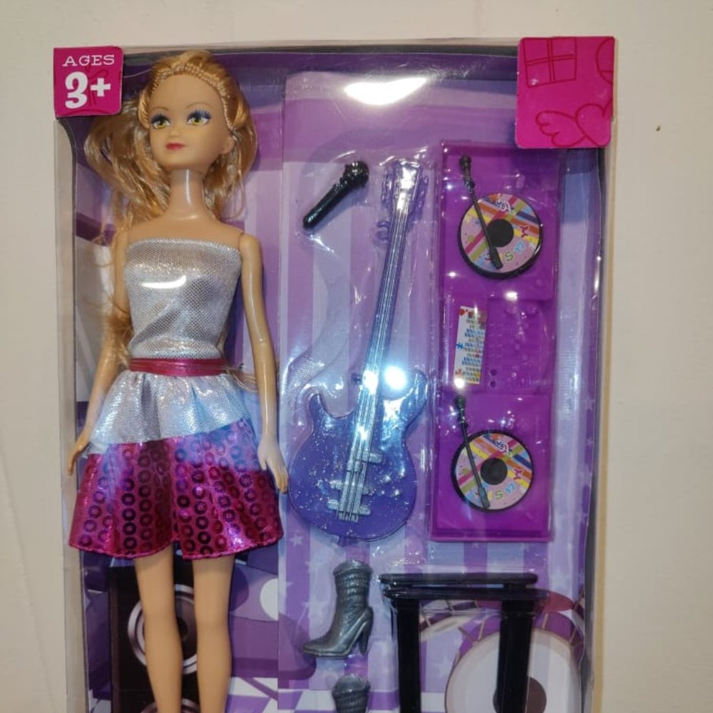 Musical Barbie doll with accessories
